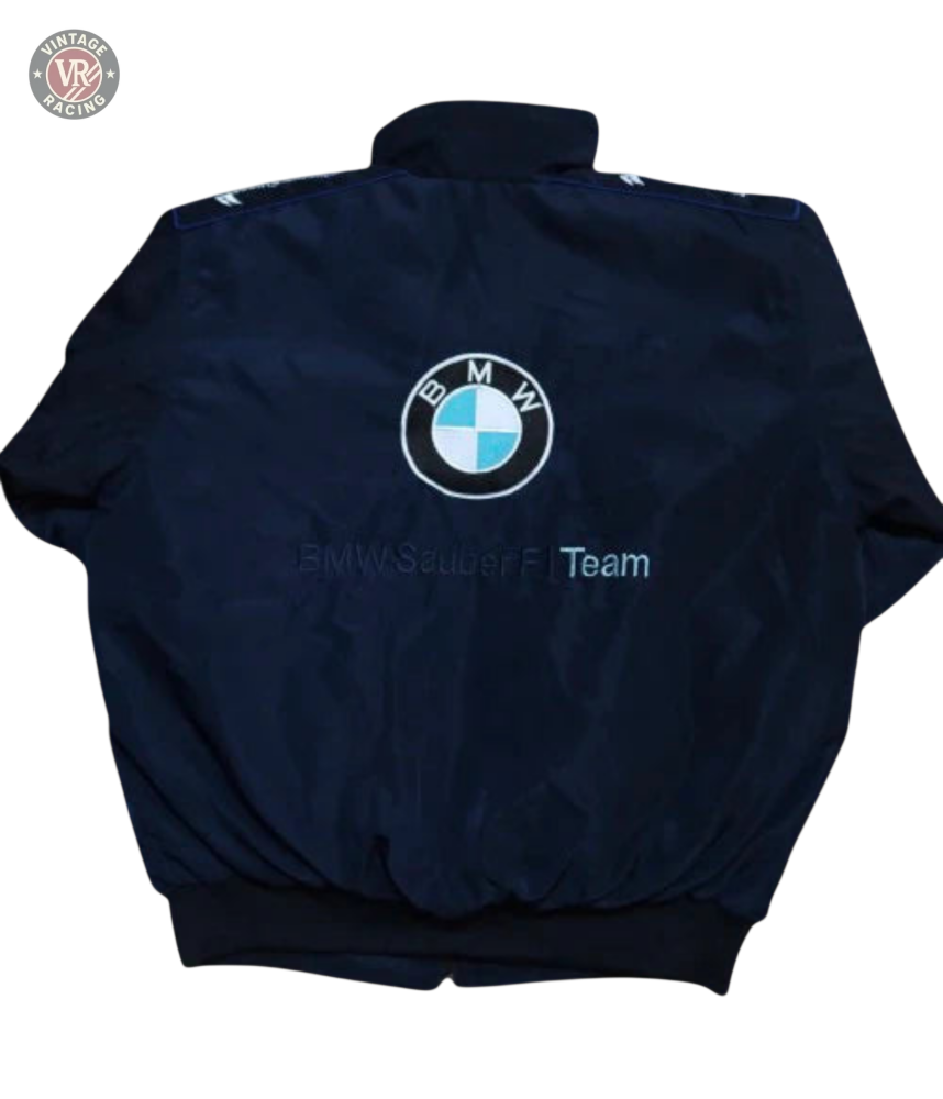 The BMW F1 Vintage Racing Jacket in black features the iconic BMW logo and BMW Sauber F1 Team text on the back, reflecting true racing heritage.