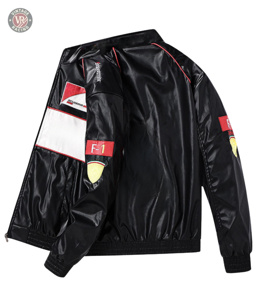 The F1 Vintage Leather Jacket - White Edition is a shiny black vegan leather jacket with red and white accents, F1 and racing car graphics on the arms and back—a bold motorsport streetwear piece shown against a plain background.