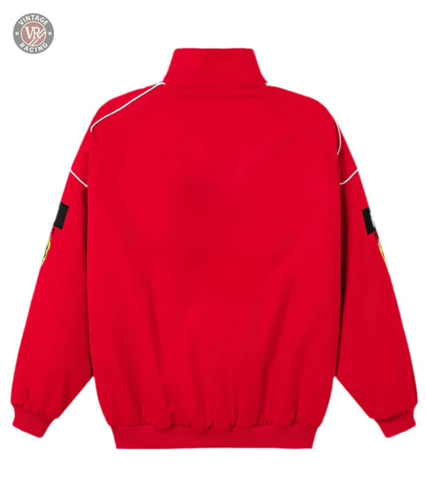 The F1 Vintage Racing Jacket - Red Edition features a Ferrari red back view, high collar, white piping on the shoulders, black sleeve patches, and elastic cuffs and waistband for a classic racing look.