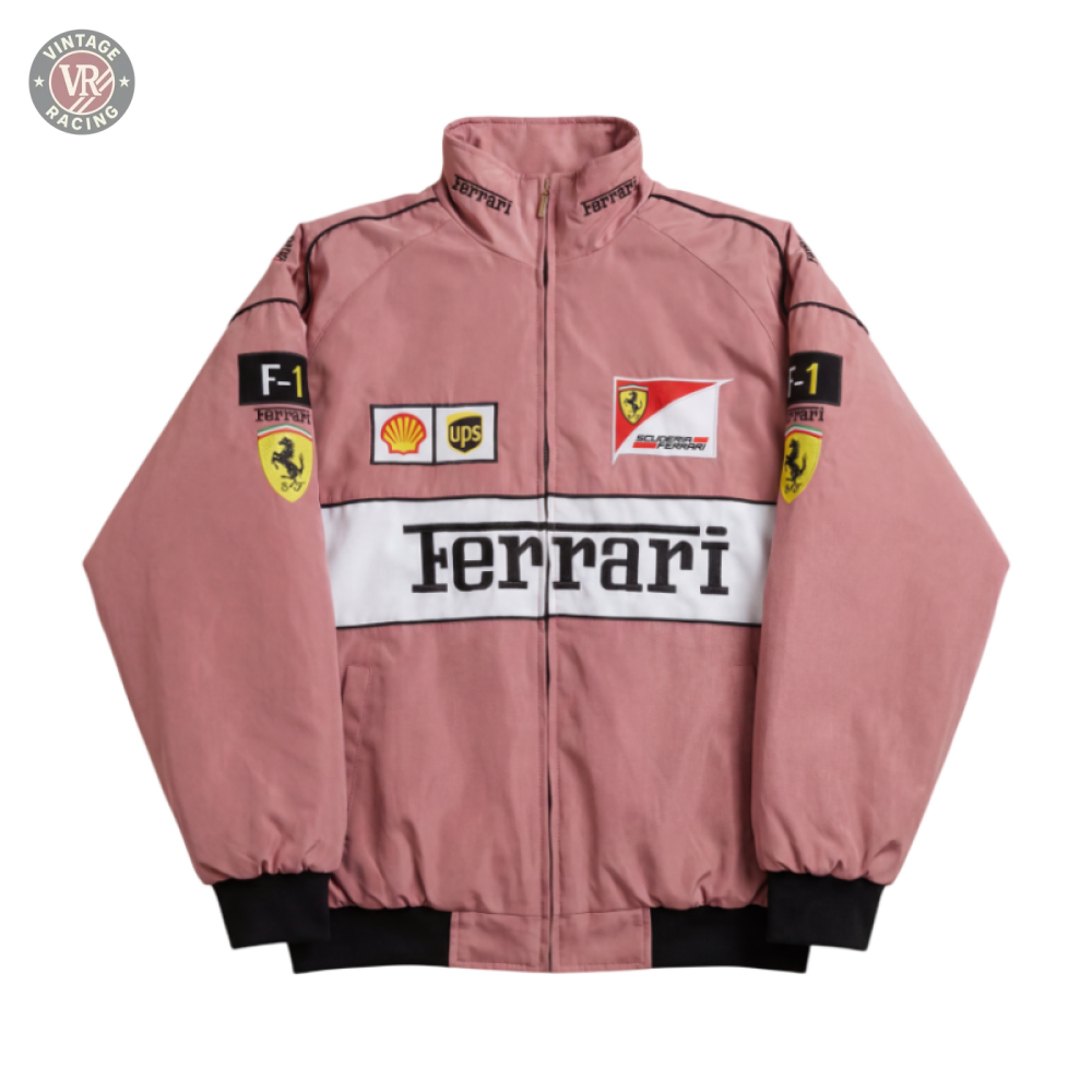 The Ferrari F1 Vintage Racing Jacket - Rose Edition is a pink jacket with Ferrari logos on the chest and sleeves, black cuffs, a high collar, and sponsor patches like Shell and UPS.