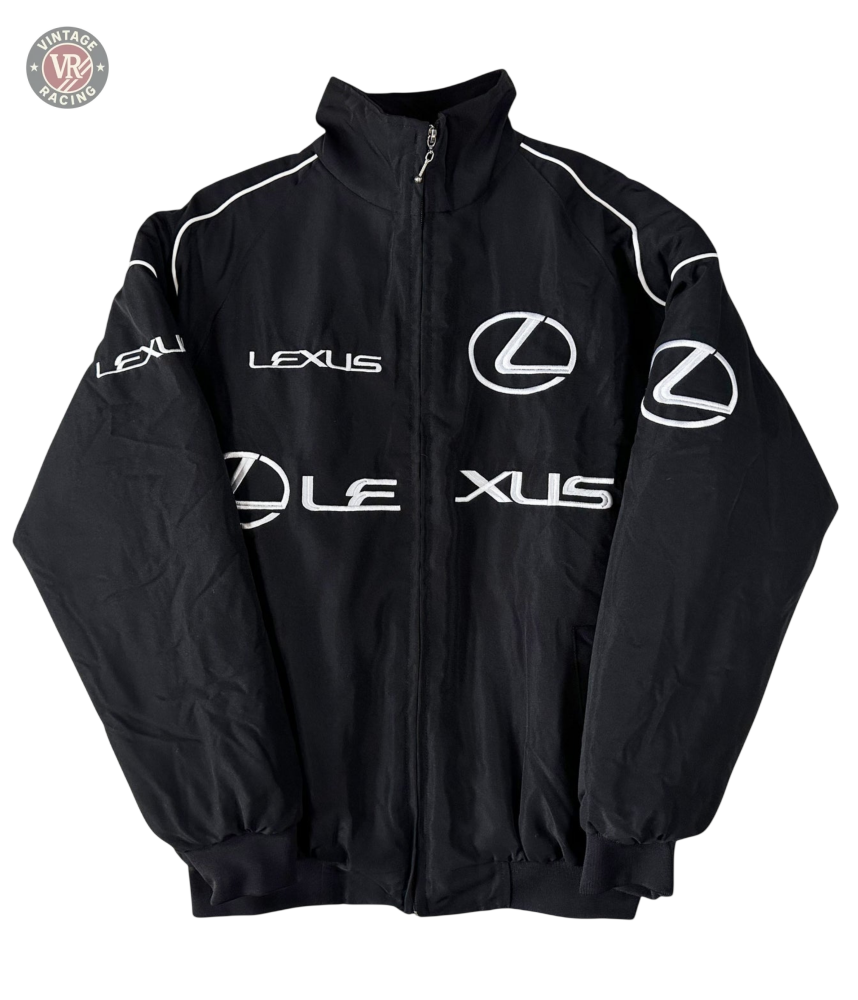 The Lexus Vintage Racing Jacket is a black zip-up with multiple white Lexus logos and LEXUS on the front, sleeves, and shoulders. Featuring a high collar and elastic cuffs, this automotive-inspired jacket blends modern luxury and motorsport style.