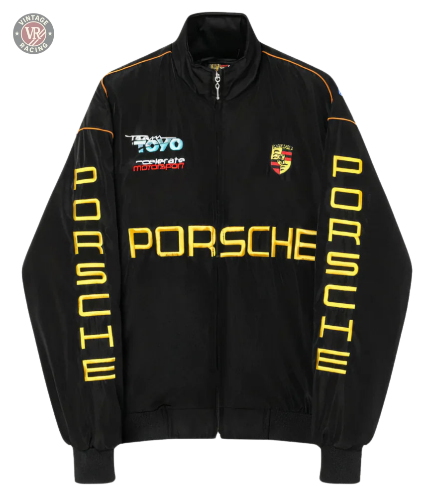 The Porsche Vintage Racing Jacket in black features yellow PORSCHE text on the front and sleeves, a Porsche logo on the chest, and sponsor logos including TOYO TIRES—ideal for retro motorsport style and Porsche fans.