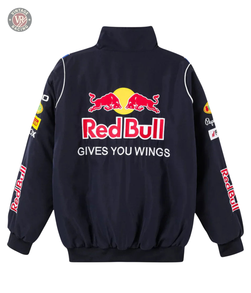 The Red Bull Racing F1 Jacket is black and features the iconic logo, two red bulls, GIVES YOU WINGS on the back, plus sponsor logos on the sleeves and shoulders—perfect for F1 fans to show their passion.