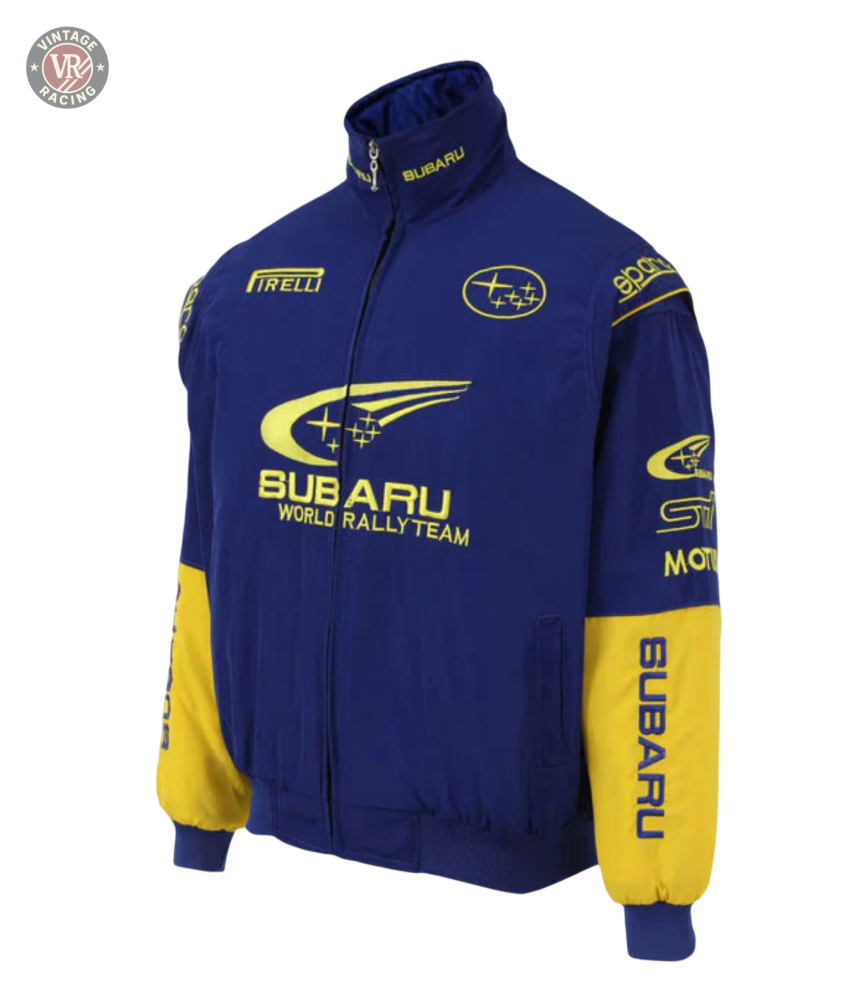 The Subaru World Rally Team Vintage Jacket features blue and yellow 555 livery, logos, and text on the front, sleeves, and collar. It has a zip closure with ribbed cuffs and hem for a classic look.