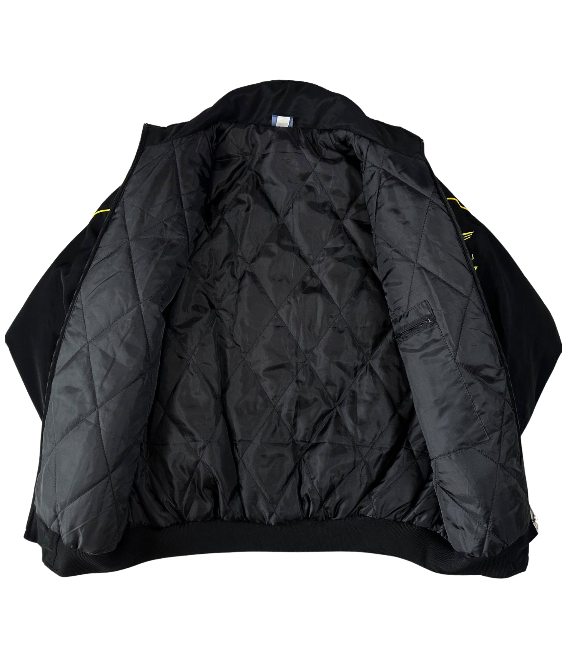 The Subaru Rally Vintage Racing Jacket is displayed open on a white background, showcasing its quilted diamond-pattern lining and classic rally heritage style.