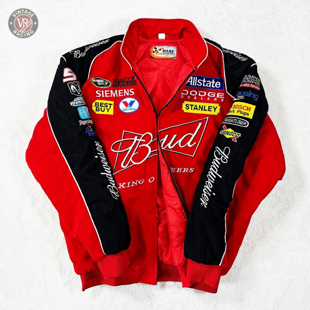 The Budweiser Racing Vintage Jacket - NASCAR Red Edition features striking red and black colors with sponsor patches from Dodge, Allstate, Best Buy, Stanley, Siemens, and more—displayed here on a white surface.