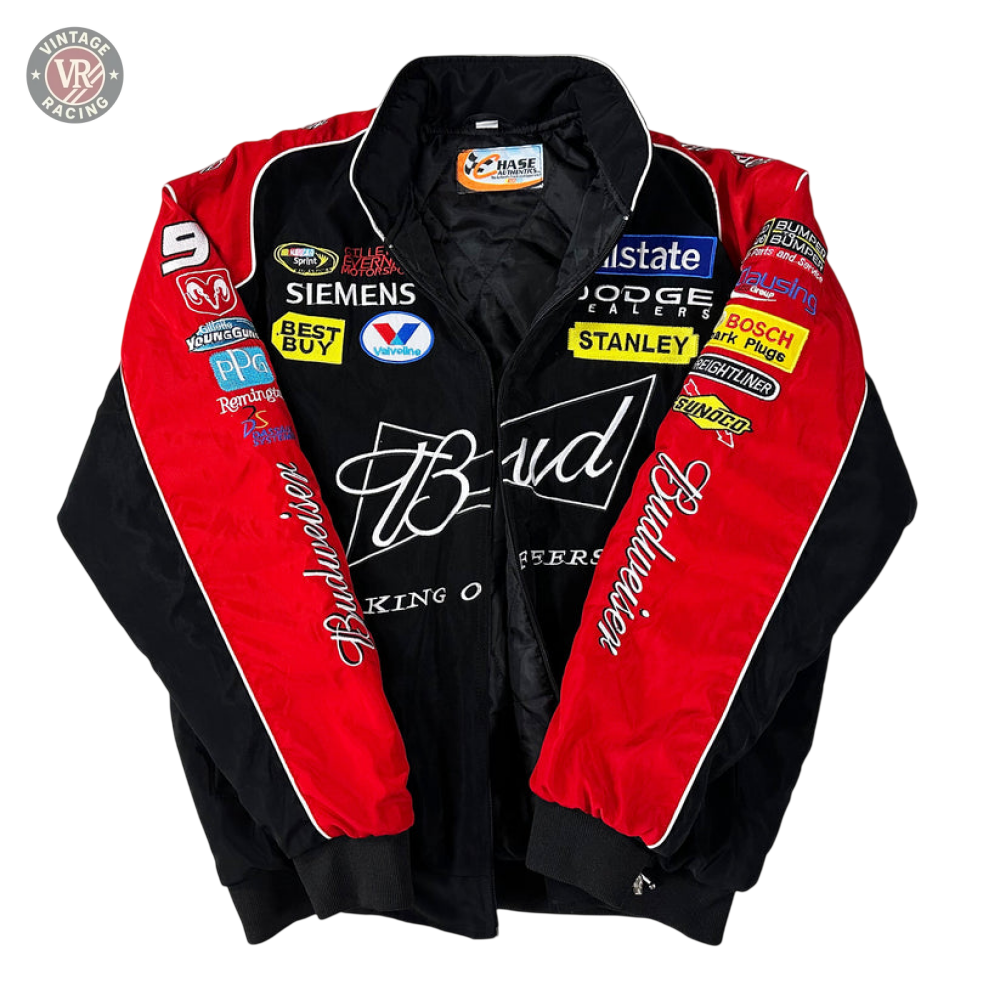 The Budweiser Vintage Racing Jacket - NASCAR Black Edition in black and red features Budweiser branding on the front, with Siemens, Dodge, Best Buy, and Stanley sponsor patches on the sleeves and chest.