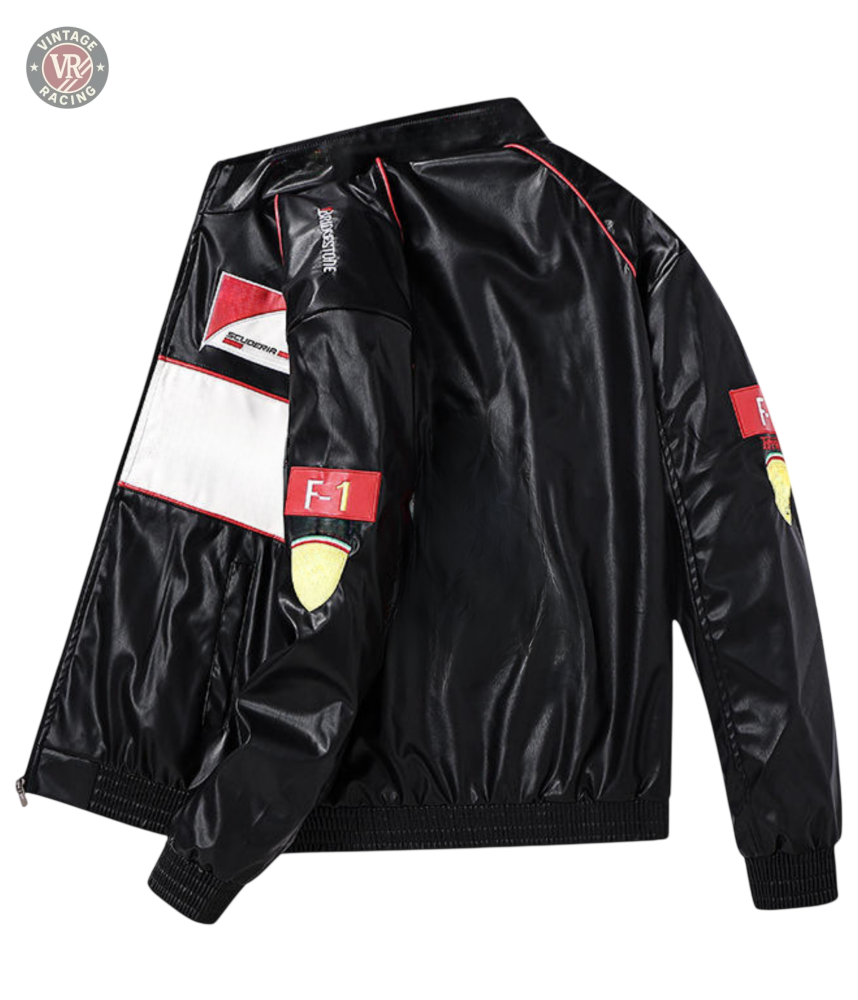 The F1 Vintage Leather Jacket - White Edition is a shiny black vegan leather jacket with red and white accents, F1 and racing car graphics on the arms and back—a bold motorsport streetwear piece shown against a plain background.