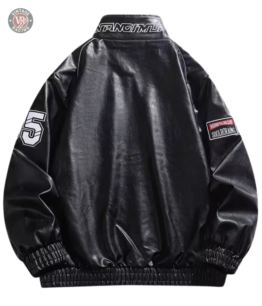 The LAP 85 Black Racing Jacket features black faux leather with a shiny finish, elastic cuffs and hem, a white 55 patch on the left sleeve, red-and-white patch on the right sleeve, and F1-inspired details for bold style.
