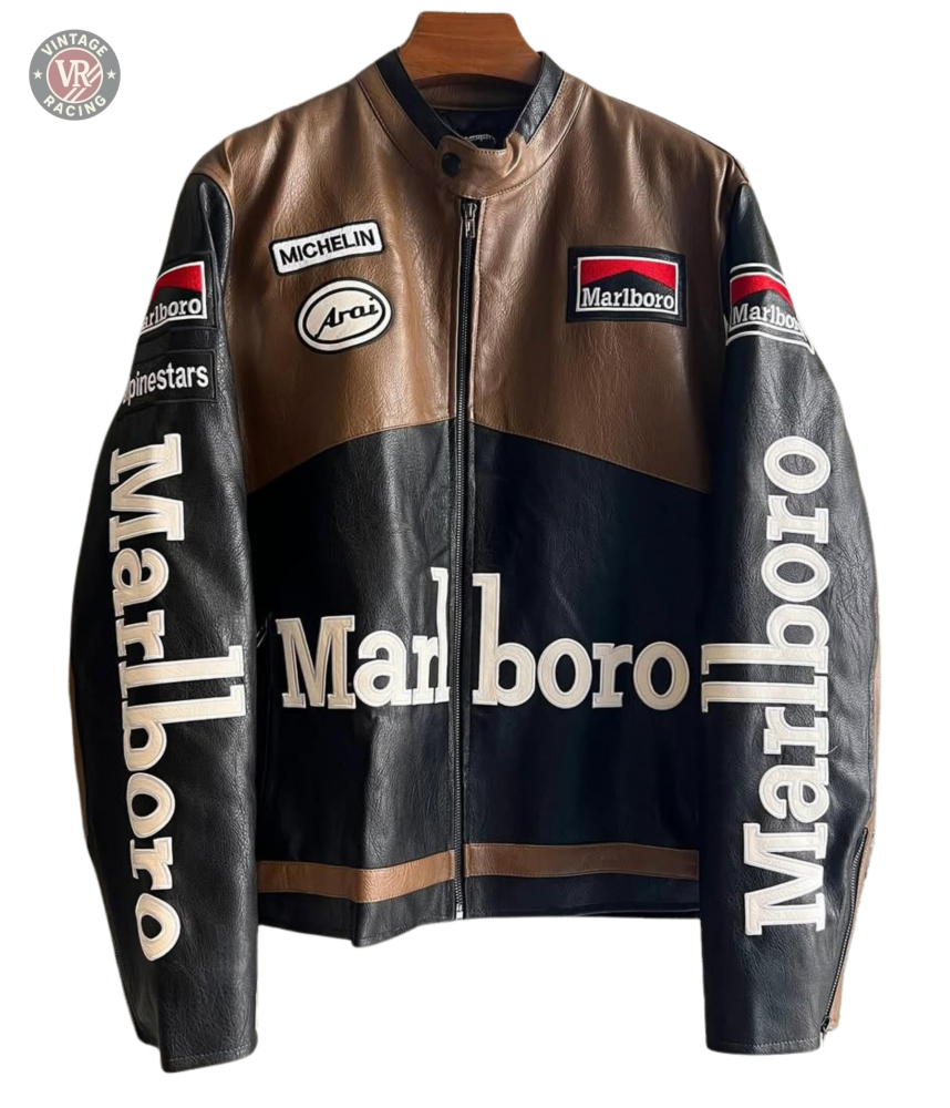 The Marlboro Racing Leather Jacket - Retro Edition is a vintage black and brown leather piece with bold logos and Motorsport style, plus Michelin, Arai, and Alpinestars patches—ideal for collectors.