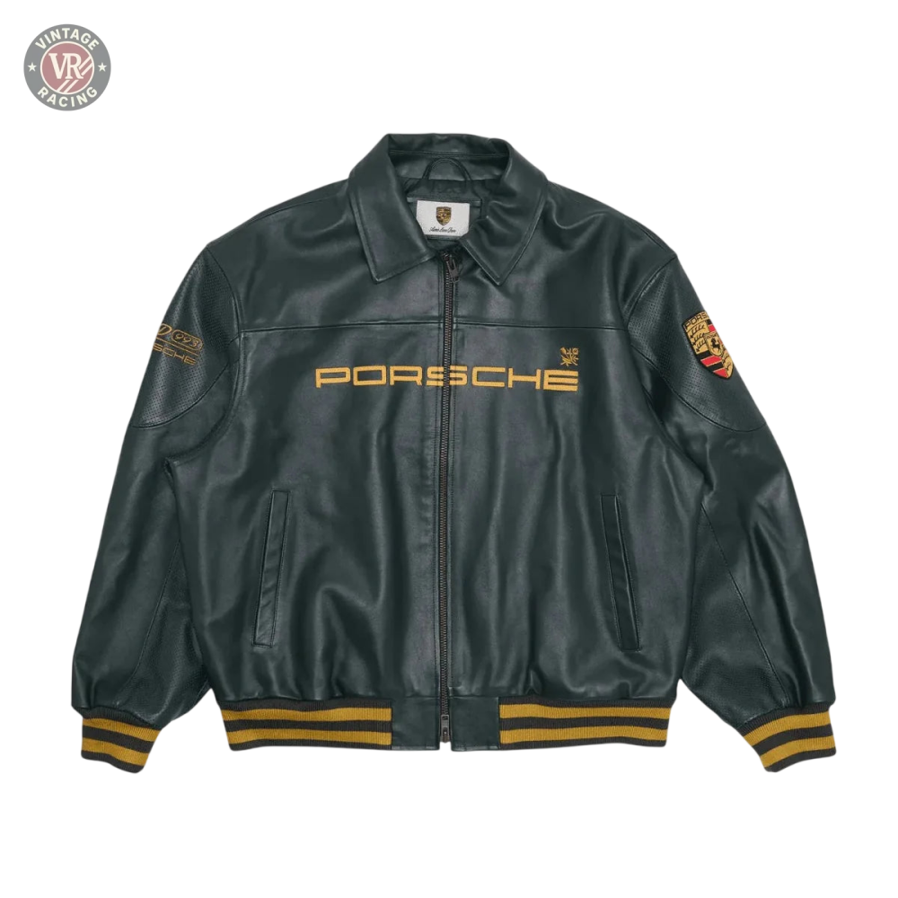 The Porsche Vintage Leather Bomber Jacket - Green Edition features green leather with yellow accents, PORSCHE embroidered on the chest, a Porsche crest on the left sleeve, and striped yellow and black cuffs and waistband.