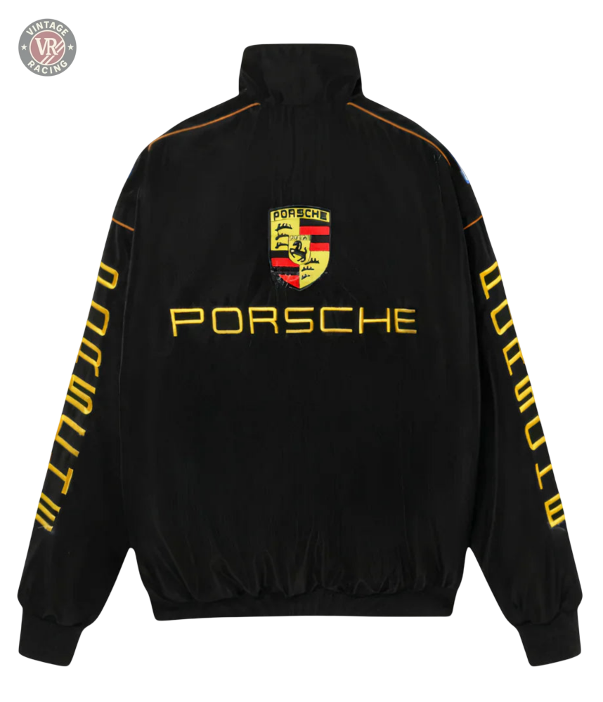 The Porsche Vintage Racing Jacket is black with yellow “Porsche” text on the back and sleeves plus a large Porsche logo on the upper back—ideal for retro motorsport jacket enthusiasts and fans of authentic trackside style.