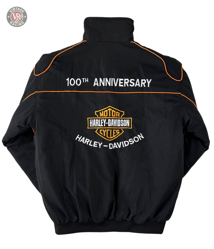 Vintage Harley Davidson Jacket with orange piping, 100th ANNIVERSARY detail, and the classic Harley-Davidson logo on the back—a must-have retro motorcycle jacket for enthusiasts.
