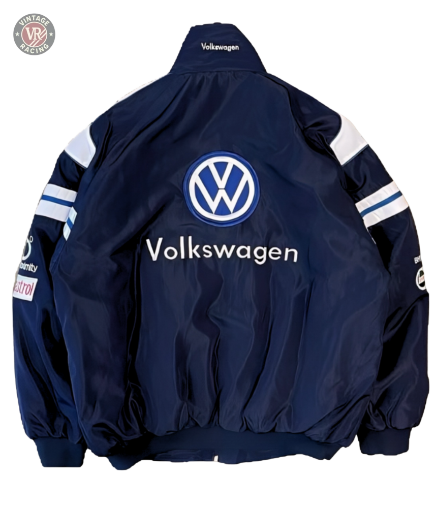 The Volkswagen Vintage Racing Jacket features a navy blue design with white sleeve stripes, sponsor patches, and a large Volkswagen logo and text on the back—ideal for fans of retro automotive or classic motorsport style.